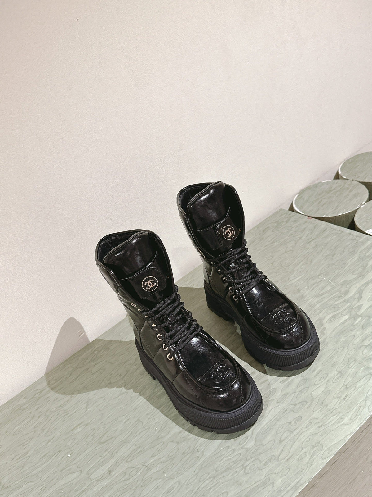 CHANEL MARTIN BOOTS IN BLACK EMBROIDERED CALFSKIN